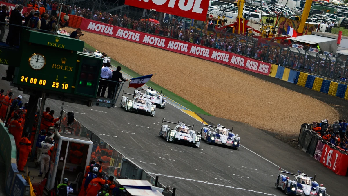 Modern Rolling Start Formation at Le Mans Modern endurance prototype field conducting the official rolling start at Le Mans